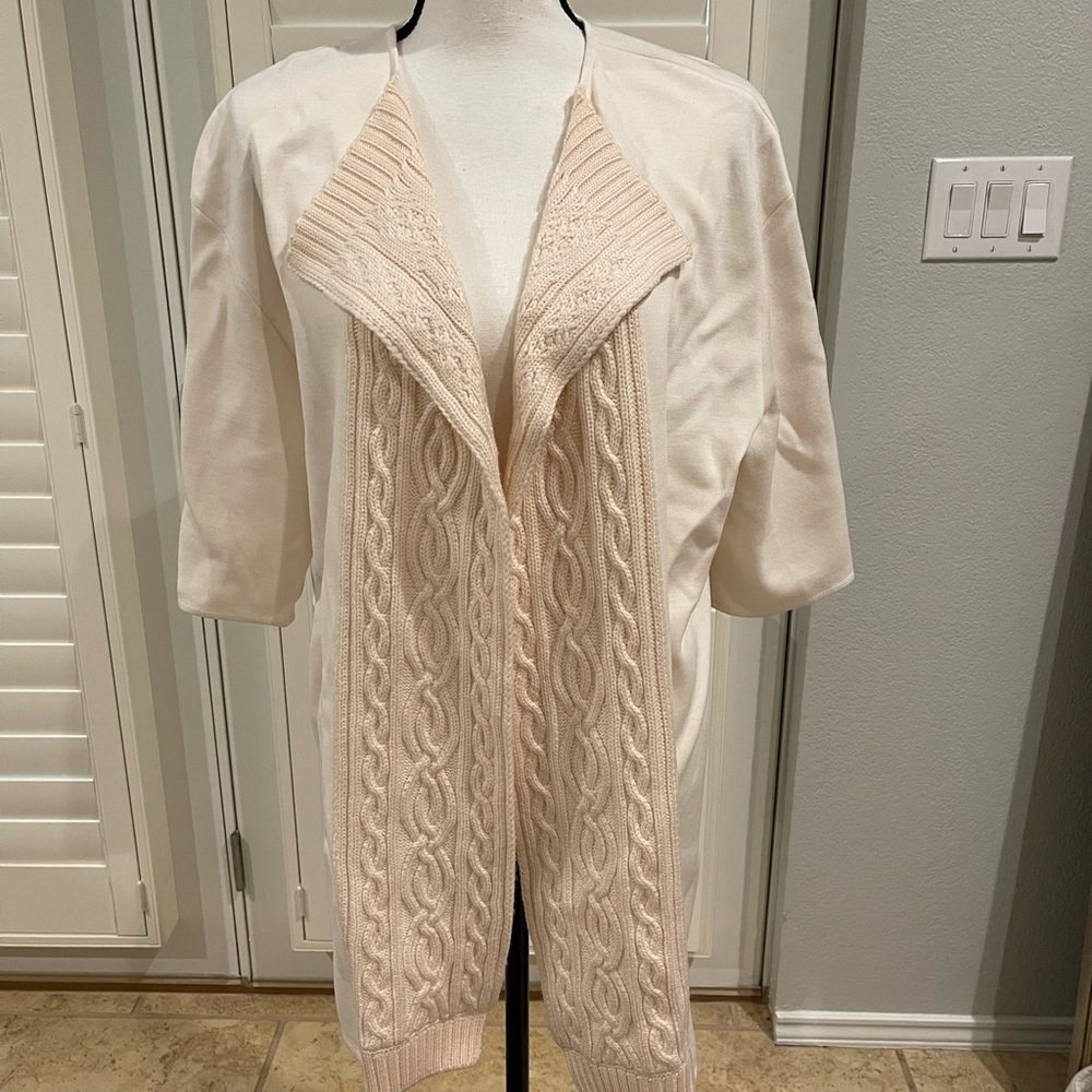 St. John ivory short sleeve jacket/sweater.